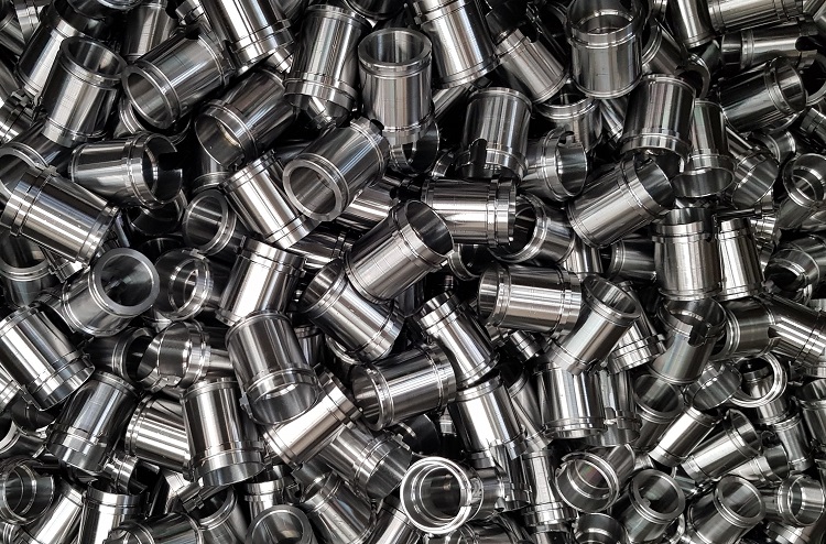 CNC precision turning for stainless steel bushing production in Italy.